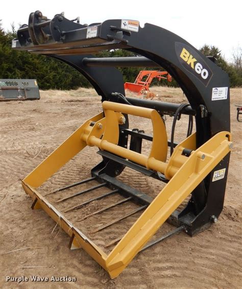 skid steer bale processor|round bale cutter for skidsteer.